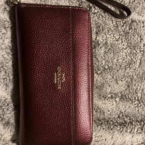 Coach burgundy wristlet